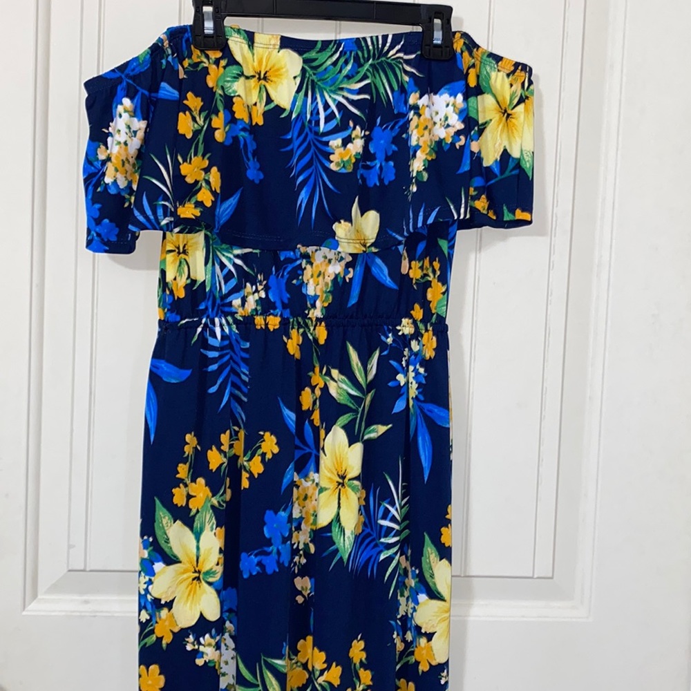 This maxi dress is a small, dark blue with tropical print made from My Story.
